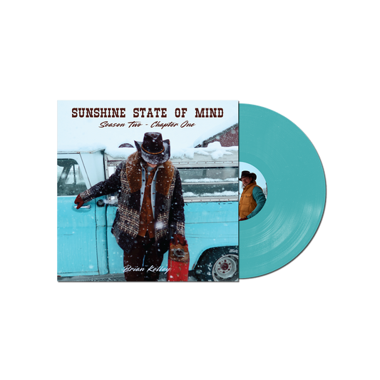 Vinyl record with cover featuring a person in a snowy setting and text 'Sunshine State of Mind'.